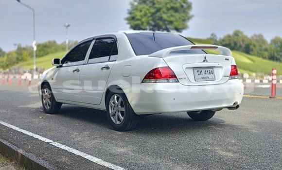 ซื้อ รถมือสอง Mitsubishi Lancer ขาว รถยนต์ ใน %{เมือง} ใน กรุงเทพมหานคร ซื้อ รถมือสอง Mitsubishi Lancer ขาว รถยนต์ ใน %{เมือง} ใน กรุงเทพมหานคร