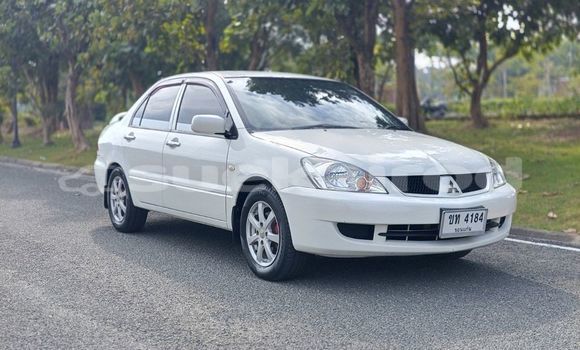 ซื้อ รถมือสอง Mitsubishi Lancer ขาว รถยนต์ ใน %{เมือง} ใน กรุงเทพมหานคร ซื้อ รถมือสอง Mitsubishi Lancer ขาว รถยนต์ ใน %{เมือง} ใน กรุงเทพมหานคร