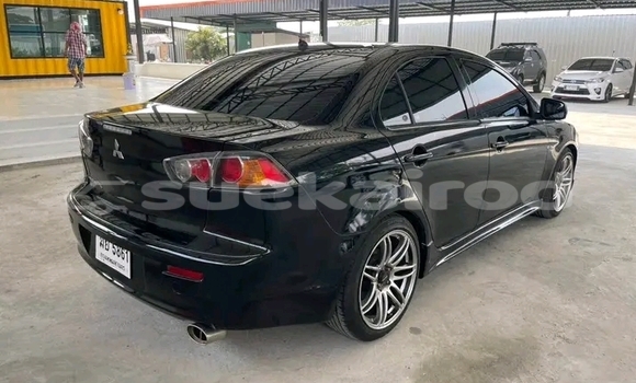 ซื้อ รถมือสอง Mitsubishi Lancer สีดำ รถยนต์ ใน %{เมือง} ใน ฉะเชิงเทรา ซื้อ รถมือสอง Mitsubishi Lancer สีดำ รถยนต์ ใน %{เมือง} ใน ฉะเชิงเทรา