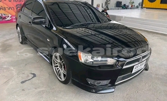 ซื้อ รถมือสอง Mitsubishi Lancer สีดำ รถยนต์ ใน %{เมือง} ใน ฉะเชิงเทรา ซื้อ รถมือสอง Mitsubishi Lancer สีดำ รถยนต์ ใน %{เมือง} ใน ฉะเชิงเทรา
