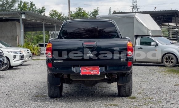 ซื้อ รถมือสอง Mitsubishi Triton สีดำ รถยนต์ ใน %{เมือง} ใน สุราษฎร์ธานี ซื้อ รถมือสอง Mitsubishi Triton สีดำ รถยนต์ ใน %{เมือง} ใน สุราษฎร์ธานี