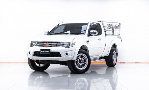 ซื้อ รถมือสอง Mitsubishi Triton ขาว รถยนต์ ใน %{เมือง} ใน กรุงเทพมหานคร