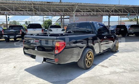 ซื้อ รถมือสอง Mitsubishi Triton สีดำ รถยนต์ ใน %{เมือง} ใน สุราษฎร์ธานี ซื้อ รถมือสอง Mitsubishi Triton สีดำ รถยนต์ ใน %{เมือง} ใน สุราษฎร์ธานี