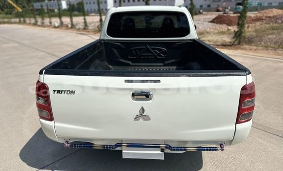 ซื้อ รถมือสอง Mitsubishi Triton ขาว รถยนต์ ใน %{เมือง} ใน สุราษฎร์ธานี ซื้อ รถมือสอง Mitsubishi Triton ขาว รถยนต์ ใน %{เมือง} ใน สุราษฎร์ธานี